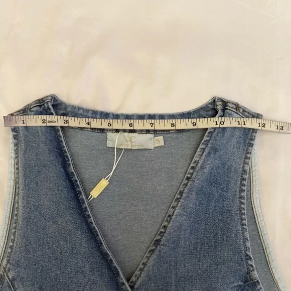 Light blue denim vest with buckle details on the sides - Picture 5 of 8